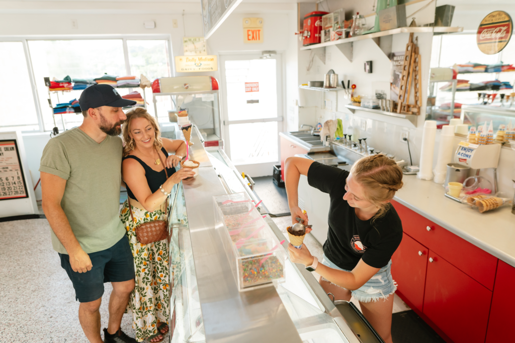 Couple enjoying ice cream a Downtown Decorah ice cream shop Sugar Bowl.